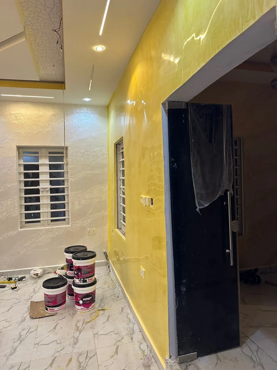 Second view of the cream and gold painted corridor