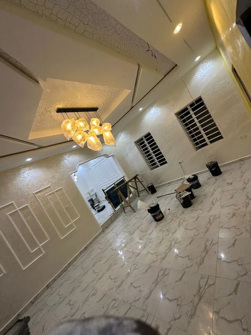 Wide view of cream interior walls and ceiling details