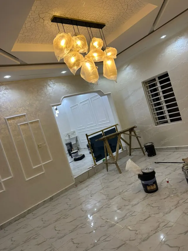Cream feature wall with white rectangular moulding