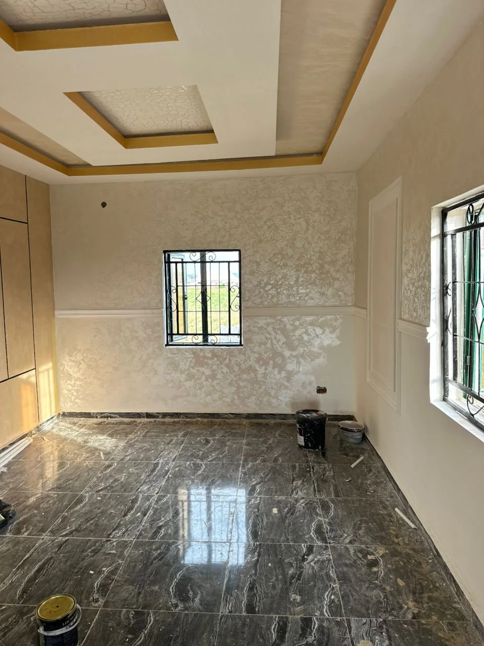 Corner view of the warm neutral finished room