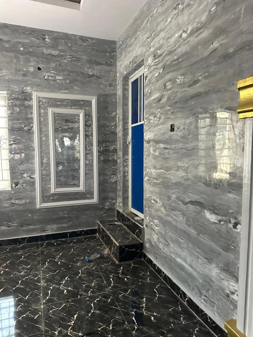 Second view of the grey marble-effect entrance area